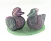 Fluorite ducks on aventurine leaf Fluorite ducks on aventurine leaf