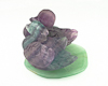 Fluorite ducks on aventurine leaf