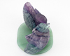 Fluorite ducks on aventurine leaf