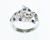 Blue sapphire, ruby and diamond ring