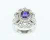 Color-change sapphire and diamond ring Color-change sapphire and diamond ring