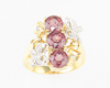 Color-change garnet and diamond ring Color-change garnet and diamond ring