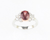 Color-change garnet and diamond ring