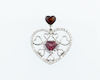 Garnet and diamond pendant Garnet and diamond pendant