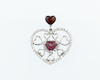 Garnet and diamond pendant