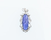 Blue sapphire and diamond pendant