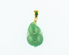 Jadeite (type-A) carving and tsavorite garnet pendant Jadeite (type-A) carving and tsavorite garnet pendant