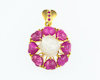 Mother of pearl carving and ruby pendant Mother of pearl carving and ruby pendant