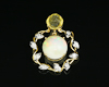 Opal carving and diamond pendant Opal carving and diamond pendant