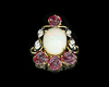 Opal, ruby carving and diamond pendant