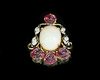 Opal, ruby carving and diamond pendant Opal, ruby carving and diamond pendant