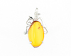 Amber and diamond pendant