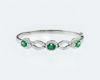 Tsavorite garnet and diamond bangle