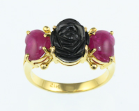 Onyx carving and ruby ring