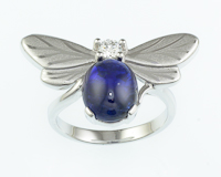 Blue sapphire and diamond ring