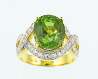 Peridot and diamond ring