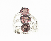 Color-change garnet and diamond ring