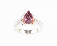 Color-change garnet and diamond ring