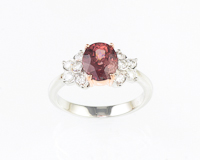 Color-change garnet and diamond ring