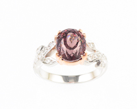 Color-change garnet and diamond ring