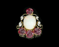 Opal, ruby carving and diamond pendant