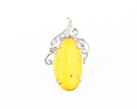 Amber and diamond pendant