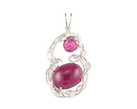 Rubellite, ruby carving and diamond pendant